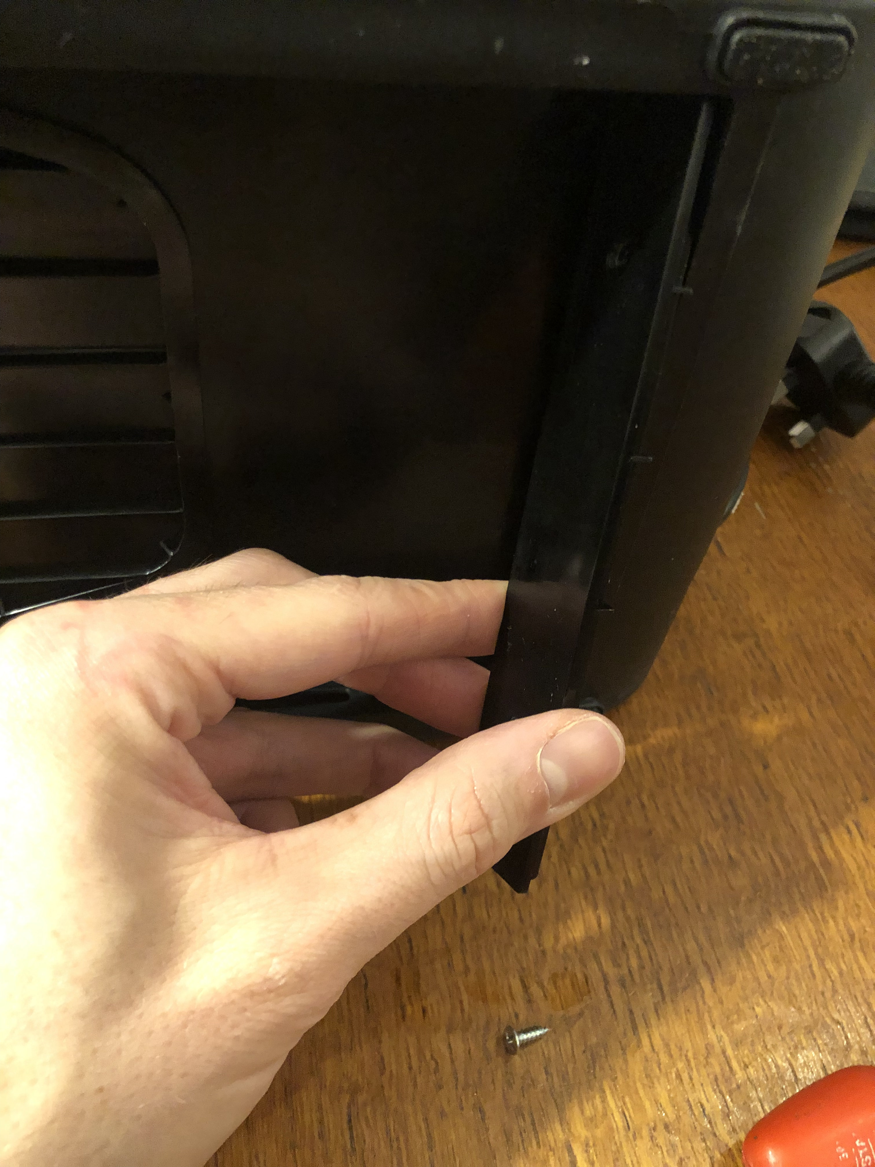 re-fitting the final plastic piece.